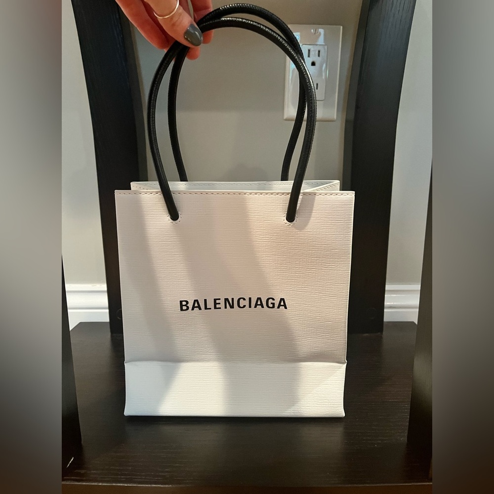 Balenciaga white shopping style hand bag! Gently preowned!